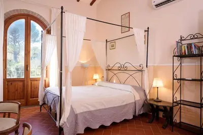 Letto o letti in una camera di Podere Dell'Anselmo