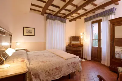 Letto o letti in una camera di Podere Dell'Anselmo