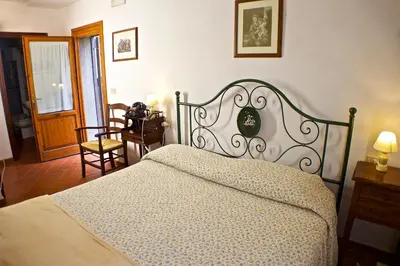 Letto o letti in una camera di Podere Dell'Anselmo