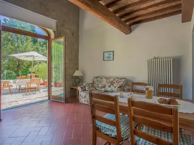 Area soggiorno di Holiday Home I Cipressi by Interhome