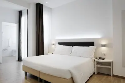 Letto o letti in una camera di Hotel Cantoria