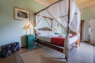 Letto o letti in una camera di Villa Ape Rosa Relais