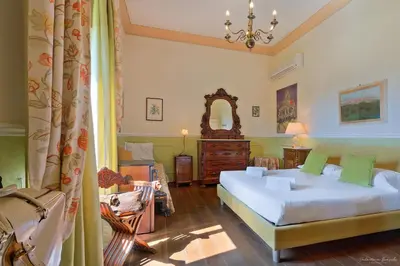Letto o letti in una camera di Villa Ape Rosa Relais