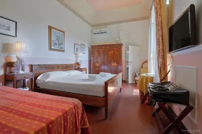 Letto o letti in una camera di Villa Ape Rosa Relais