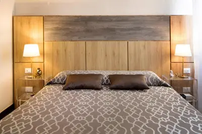 Letto o letti in una camera di Sette Angeli Rooms