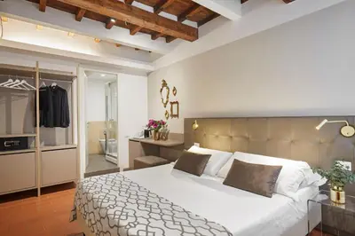 Letto o letti in una camera di Sette Angeli Rooms