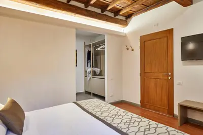 Letto o letti in una camera di Sette Angeli Rooms