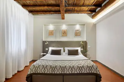 Letto o letti in una camera di Sette Angeli Rooms