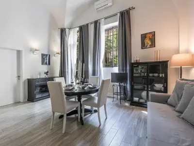 Area soggiorno di Cynthia's Garden - Apartment with private garden in Santa Croce