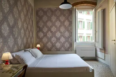 Letto o letti in una camera di B&B Lorenzo&Lorenzo Vol.2