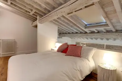 Letto o letti in una camera di Mattonaia Apartment by Mamo Florence