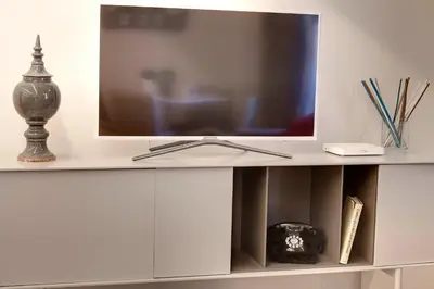 TV o dispositivi per l'intrattenimento presso Mattonaia Apartment by Mamo Florence