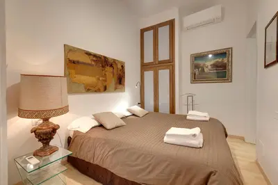 Letto o letti in una camera di Faenza Apartment