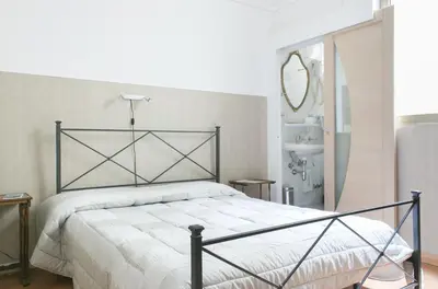 Letto o letti in una camera di Loggia Fiorentina