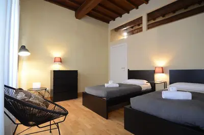 Letto o letti in una camera di Keys of Italy - Palazzuolo 112 - Keys Of Italy