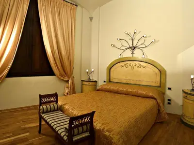 Letto o letti in una camera di Donatello Penthouse
