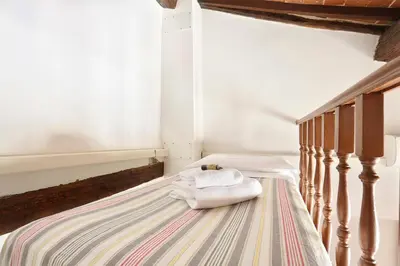Letto o letti in una camera di Tornabuoni apartment in central Florence