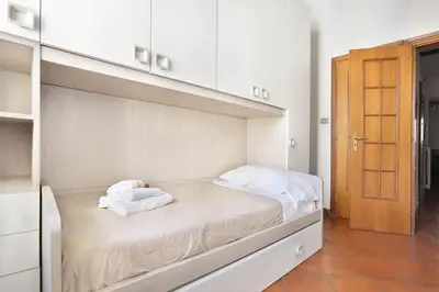 Letto o letti in una camera di Tornabuoni apartment in central Florence