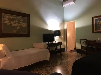 Letto o letti in una camera di Alberghino B&B
