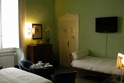 Letto o letti in una camera di Alberghino B&B