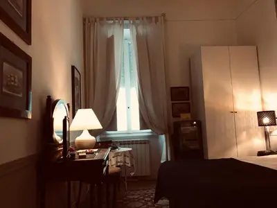 Letto o letti in una camera di Alberghino B&B
