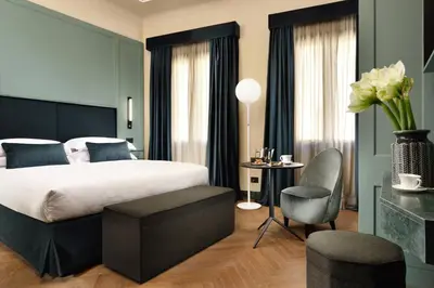Letto o letti in una camera di Floren Hotel
