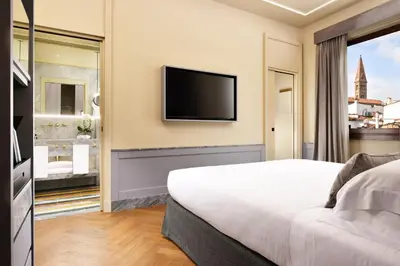 TV o dispositivi per l'intrattenimento presso Floren Hotel