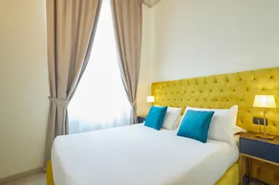 Letto o letti in una camera di Residenza Maglioni al Battistero