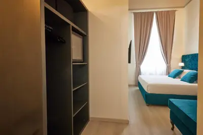 Letto o letti in una camera di Residenza Maglioni al Battistero