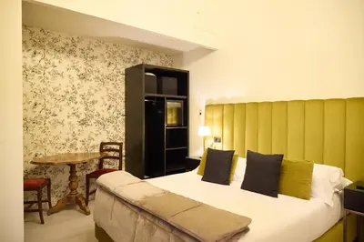 Letto o letti in una camera di Residenza Maglioni al Battistero