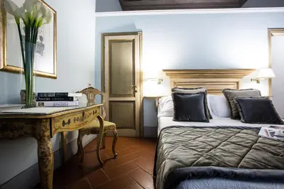 Letto o letti in una camera di Hotel Burchianti