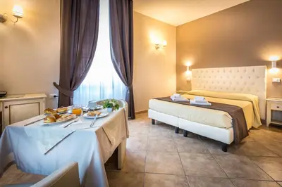 Letto o letti in una camera di Sognando Firenze