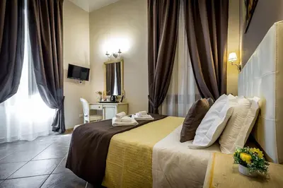 Letto o letti in una camera di Sognando Firenze