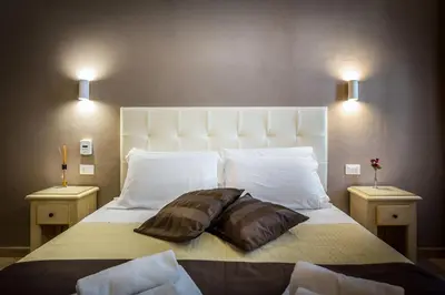 Letto o letti in una camera di Sognando Firenze