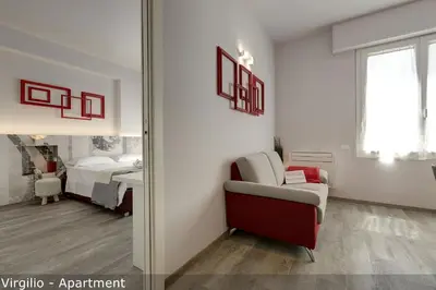 Letto o letti in una camera di Dante & Virgilio Apartments by Mamo Florence