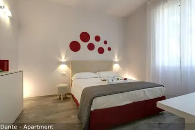 Letto o letti in una camera di Dante & Virgilio Apartments by Mamo Florence