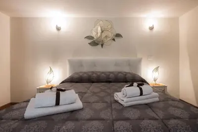 Letto o letti in una camera di Charming Suite Cavour heart of Florence