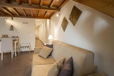 Area soggiorno di Charming Suite Cavour heart of Florence