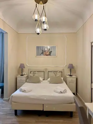 Letto o letti in una camera di Soggiorno Pezzati