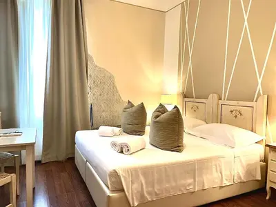 Letto o letti in una camera di Soggiorno Pezzati
