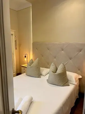 Letto o letti in una camera di Soggiorno Pezzati