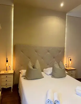 Letto o letti in una camera di Soggiorno Pezzati