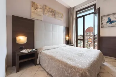 Letto o letti in una camera di Hotel Bellavista