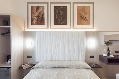 Letto o letti in una camera di Hotel Bellavista