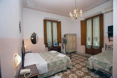 Letto o letti in una camera di Hotel Desirèe