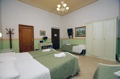 Letto o letti in una camera di Hotel Desirèe