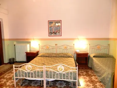 Letto o letti in una camera di Hotel Desirèe