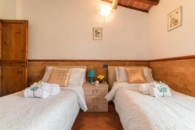Letto o letti in una camera di Piccolo Iris Firenze