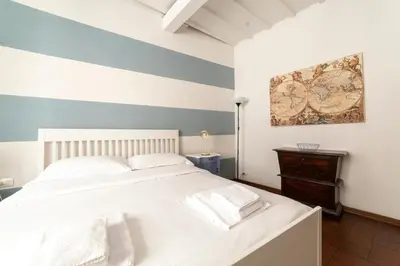 Letto o letti in una camera di A Casa Signoria, in the city heart