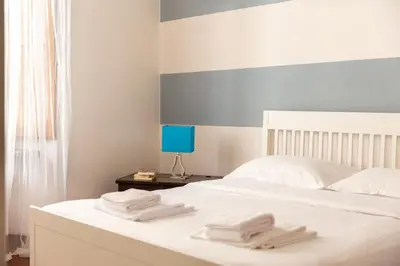Letto o letti in una camera di A Casa Signoria, in the city heart